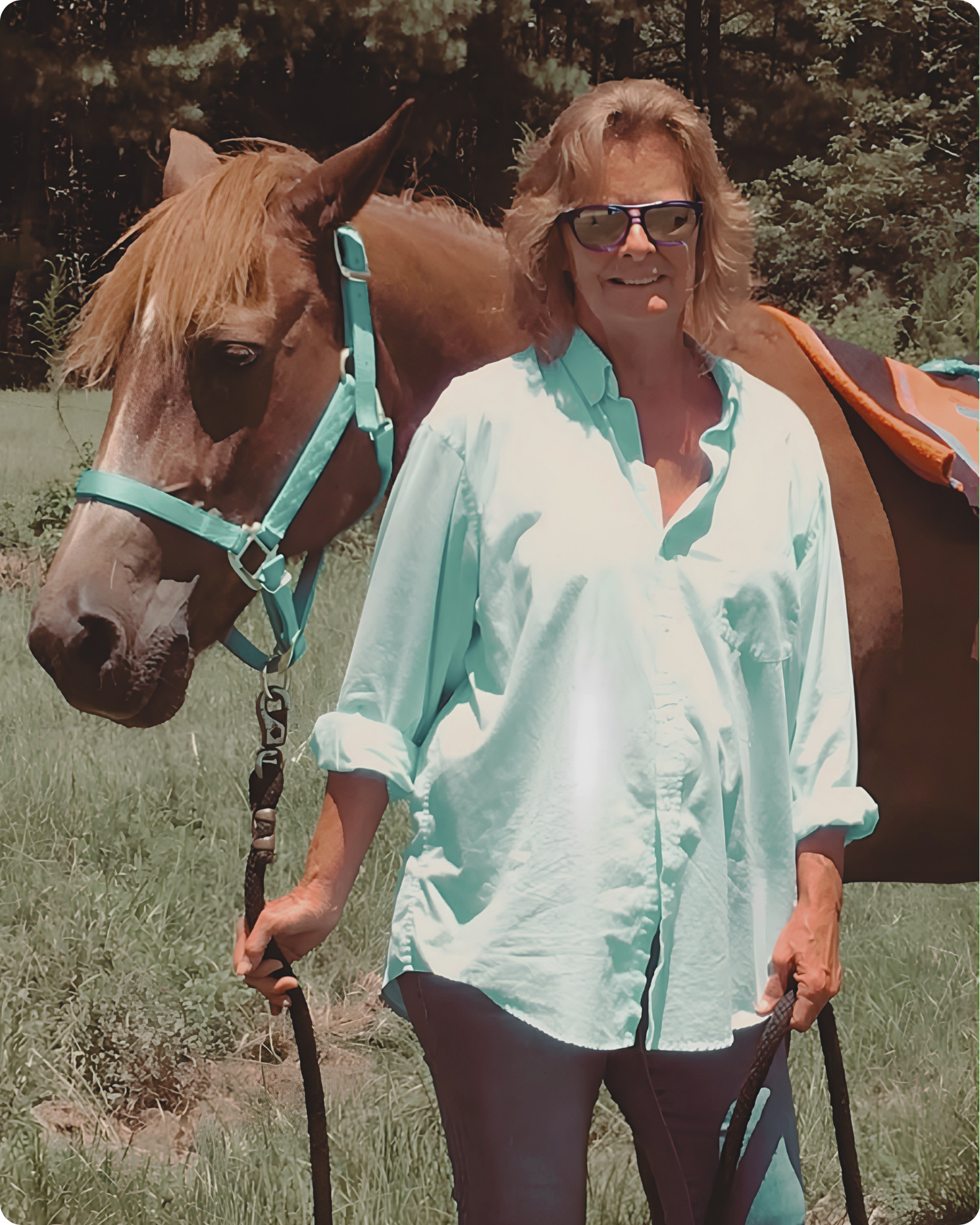 Nita Kay standing beside her horse